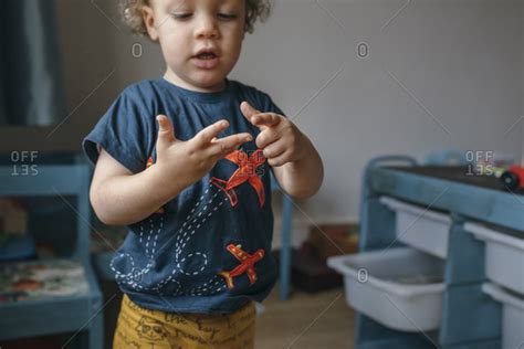 Young Boy Counting On His Hands Stock Photo Offset