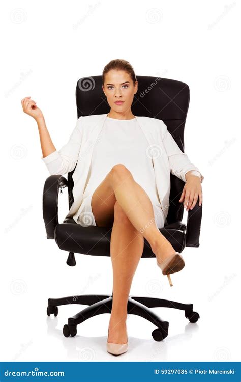 Confident Businesswoman Sitting On Armchair Stock Image Image Of Chin