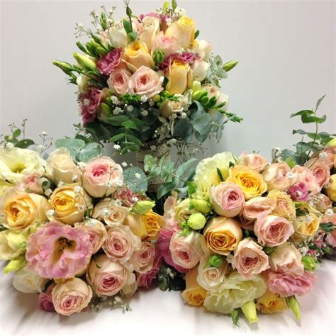 Bride And Bridesmaids Pastels Cream Peach Pink Bouquets Roses Spray