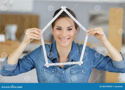 woman holding ruler in form house stock image image of saving realestate 282709629
