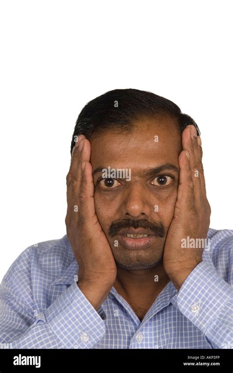 Shocked Mature Indian Man Hands On Head Stock Photo Alamy