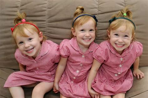these identical triplets have been colour coded to help teachers tell them apart wales online