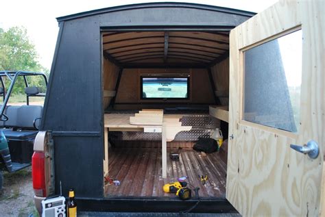 A truck camper is slid into place in the bed of a truck and then fastened onto the truck frame. homemade camper shell designs - Google Search | car camp | Pinterest | Homemade camper, Camper ...