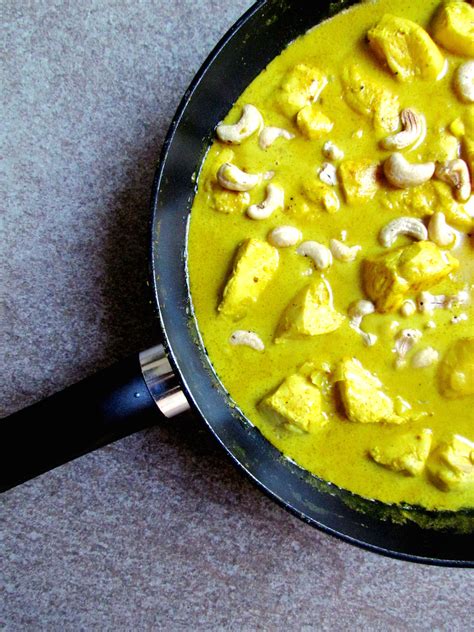 Cook and stir the onion, ginger, jalapeno peppers, and garlic 5 minutes, or until tender. coconut milk curry chicken with cashews - Savormania