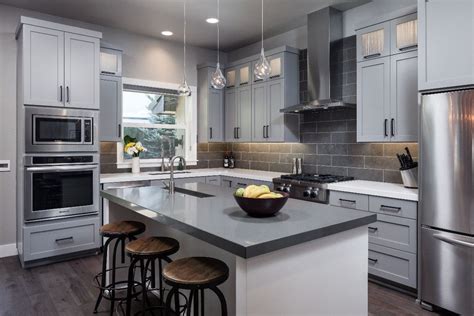 The engineered stone is dark brown and has light beige and brown veining. Design a Kitchen with Caesarstone's Concrete Quartz ...