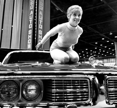 Woman Posed As A Hood Ornament At Chicago Auto Show S Car Hood