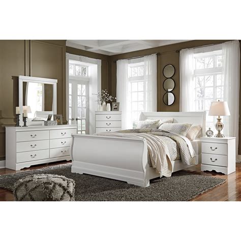 Large scaled shapely bedroom collection features bun feet. Signature Design by Ashley Anarasia Queen Bedroom Group ...
