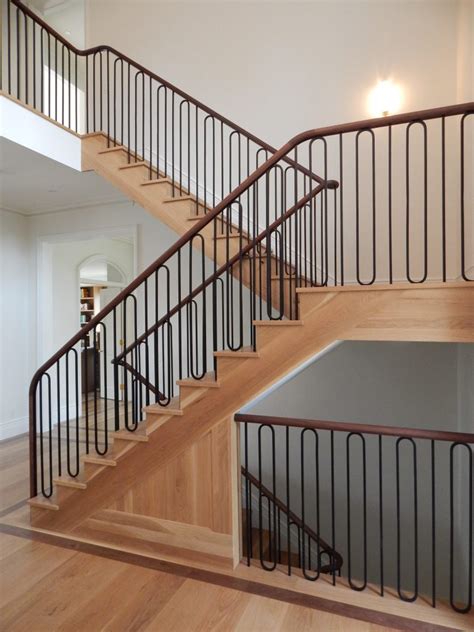 Whenever a staircase is long, or there are multiple staircases that come together, a visually lightweight stair railing is a good design choice so as to not weigh down the. Interior Railings - Compass Iron Works | Interior railings ...