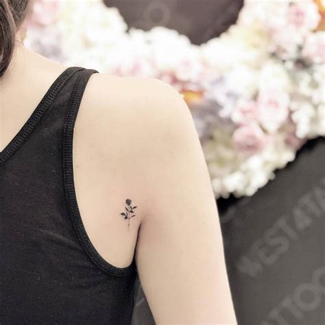 Small Black Rose Tattoo