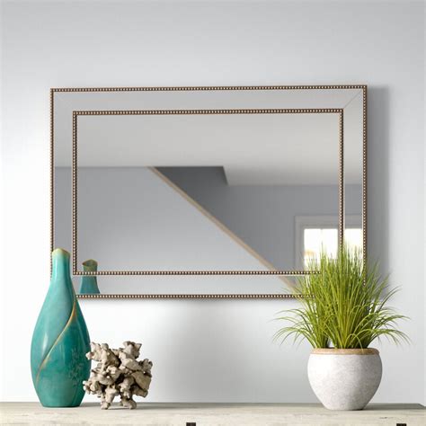 Venetian style regency modern oval wall mirror with gilt metal accents, spain, 1950s this oval mirror is full of beautiful details: Gold Flamingo Brynlee Beveled Accent Mirror & Reviews ...