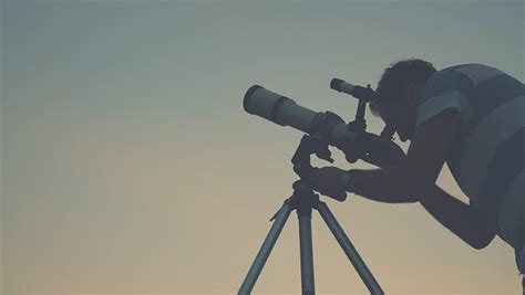 Man Looking Through A Telescope Stock Footage Video 100 Royalty Free
