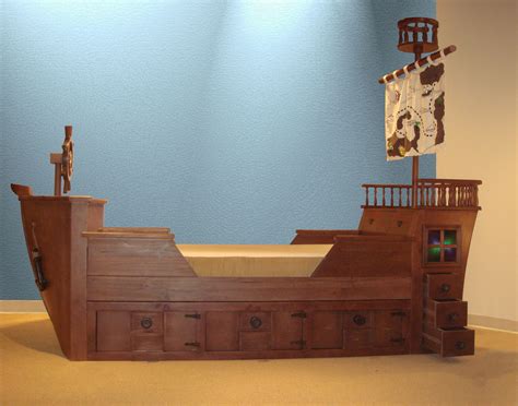 Bed is shaped like a pirate ship. Pirate Ship Beds! | Pirate room, Pirate ship bed, Cool ...