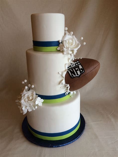 But last year, my younger brother (13) brought his grid iron ball out to me and said … Football wedding cake | superbowl wedding | seahawks ...