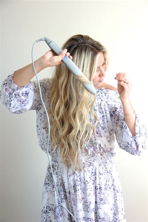 Lift the braids upwards and clip them to the crown on your head with small clips. A Fashion Love Affair | Wavy Hair Tutorial with Flat Iron