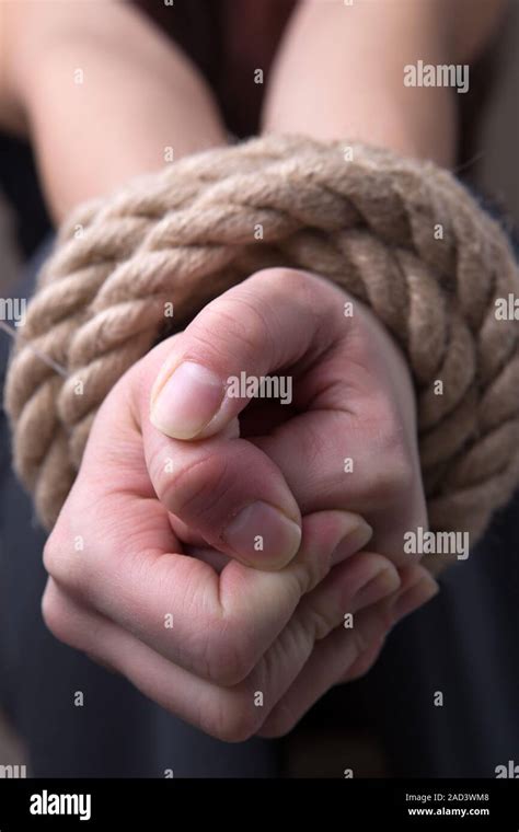 Woman Victim Rope Tied Hands Hi Res Stock Photography And Images Alamy