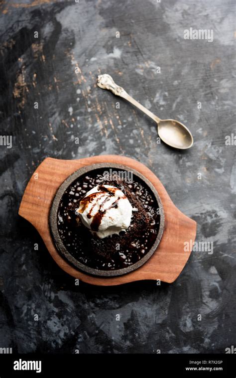 Sizzling Chocolate Brownie Is A Sweet Dish Made Using Scoop Of Ice