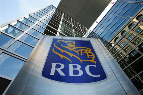 3,319 atm and branch locations. A Royal Bank of Canada (RBC) sign is seen outside of a ...