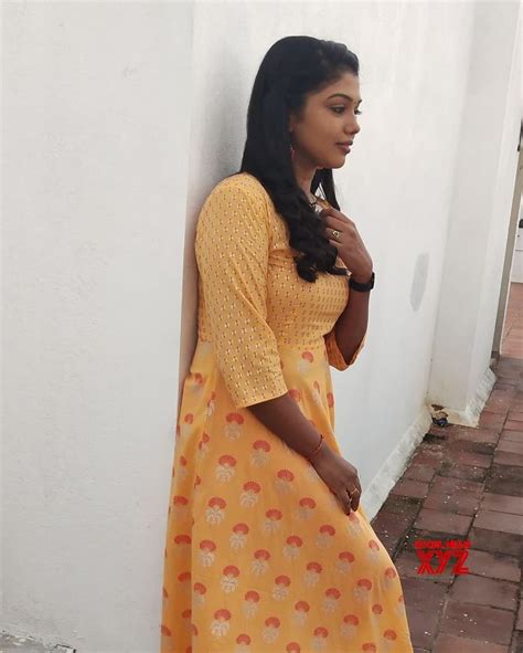 Actress Riythvika Lovely New Stills Social News XYZ Long Top Dress