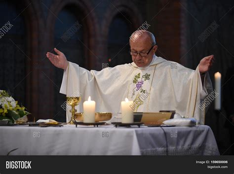 Catholic Priest Praying