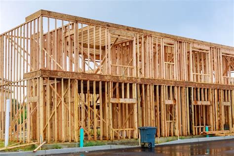 Premium Photo Framing Of Under Construction Wooden House Building