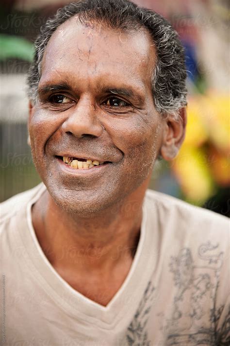 aboriginal man in his forties smiling by stocksy contributor gary radler photography stocksy