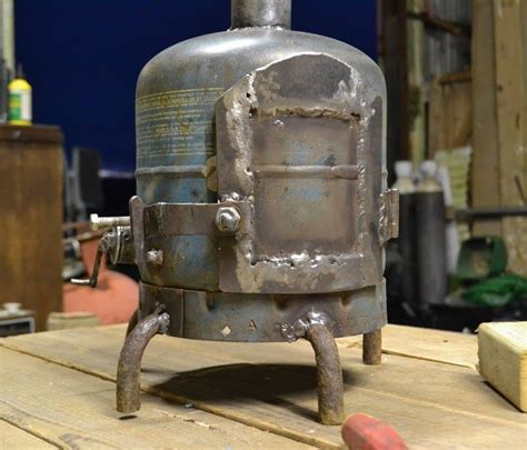 A portable stove in your bug out bag will ensure that you can prepare food to get you through the first critical 72 hours. Gas bottle DIY woodburning stove - martiensbekker.co.uk (With images) | Small wood burning stove ...