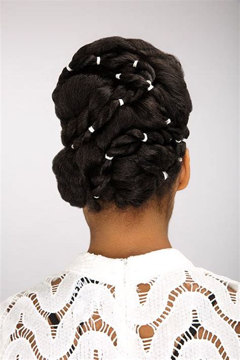 The Essence To Dionne Smiths Bridal Updos Are Intricate Partings And