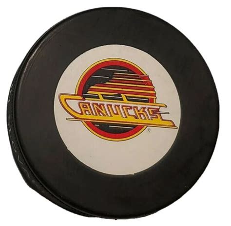 vancouver canucks nhl vintage official trench mfg vegum puck slovakia ebay