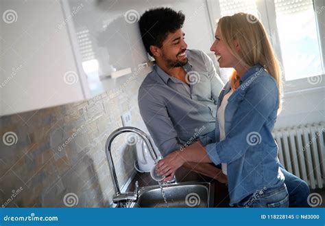 Young Couple Doing Dishes In The Kitchen Stock Image Image Of Female