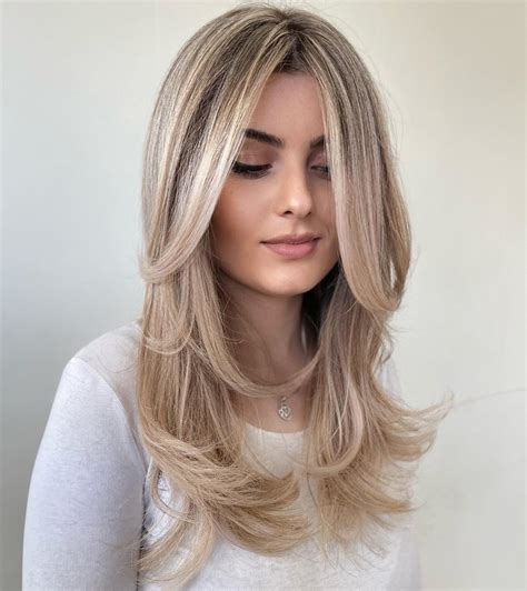 30 hot looks with face framing layers to sport in 2022 hair adviser wavy layered hair