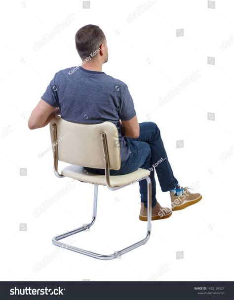 Back View Of A Man Sitting On A Chair Rear View People Collection The