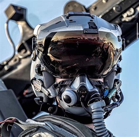 Belgian Air Force F 16 Pilot Donning An Hmcs Helmet Mounted Cueing