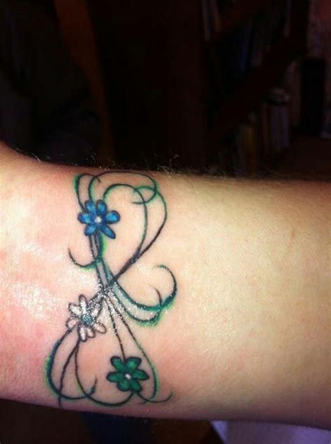 Use Daisy And Or Sweet Pea Flowers Infinity Tattoos Tattoos For
