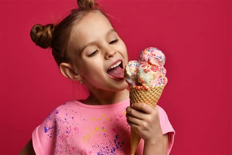 Pretty Baby Girl Kid Eating Licking Big Ice Cream In Waffles Con