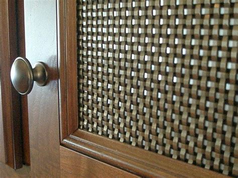 It is a custom order and runs about $28 a square foot for the heavier woven mesh in the front and not the screening. The rich, walnut cabinetry of this home is complemented by ...