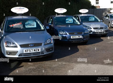 Second Hand Used Cars For Sale On Garage Forecourt Stock Photo Royalty