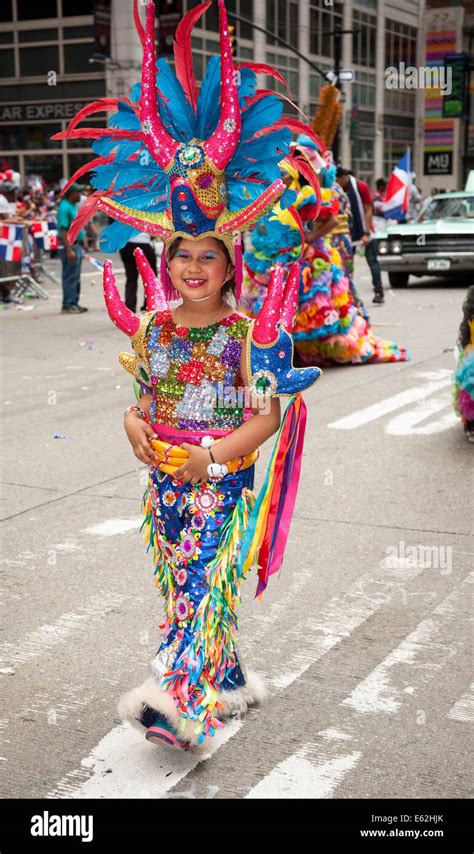 costumed dancer from santiago dominican republic marches in the 33rd annual dominican day