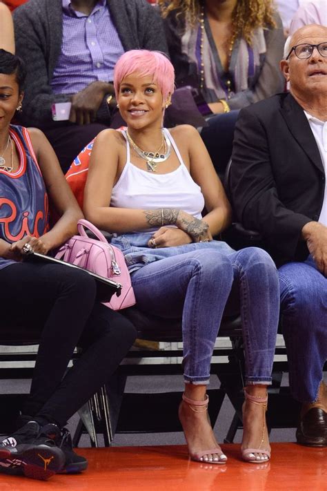 Rihanna Gropes Her Breasts Courtside As She Shows Off New Raunchy Pink