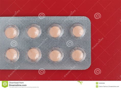 Close Up Of A Pack Of Orange Pills Stock Photo Image Of Isolated
