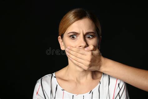 Hand Covering Mouth Of Woman On Dark Background Panic Attack Stock