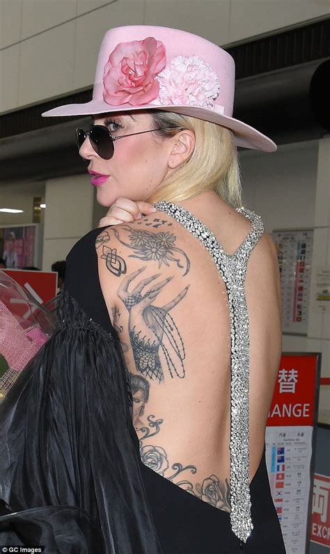 Lady Gaga Shows Off Her Intricate Back Tattoos As She Lands In Japan Daily Mail Online