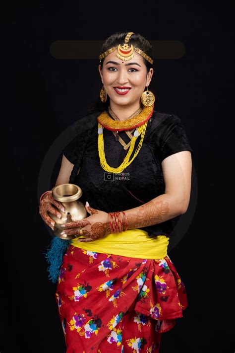 Nepali Girl Holding Karuwa In Traditional Attire Photos Nepal