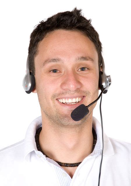 Customer Service Guy Smiling Over A White Background Freestock Photos