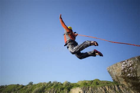 Jump Off A Cliff With A Rope Stock Photo Image Of Cord Freedom