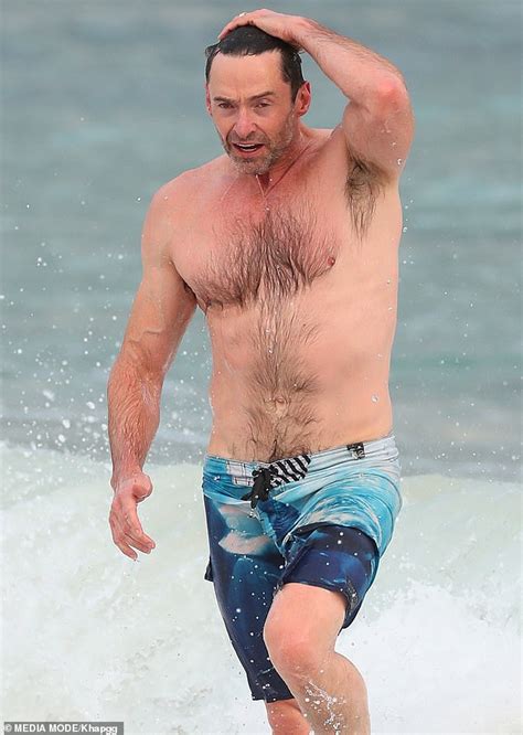 hugh jackman 50 reveals his ripped physique at sydney s bondi beach daily mail online