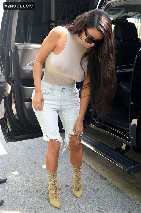kim kardashian goes braless in miami wearing a top aznude