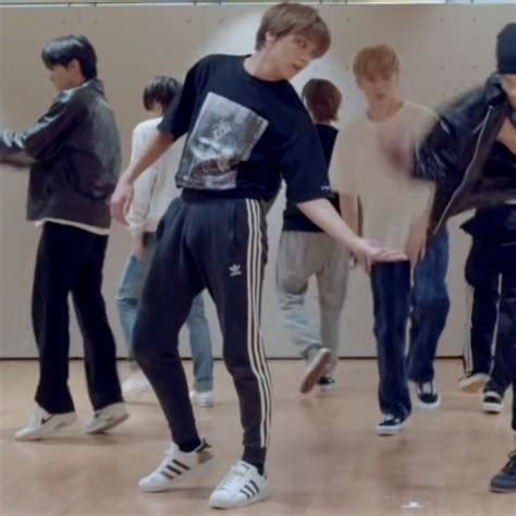 Several Babe Men Are Dancing In A Dance Studio