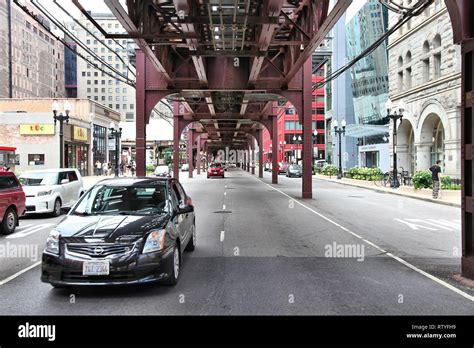 Chicago Usa June 28 2013 Cars Drive Under Elevated Train Tracks In