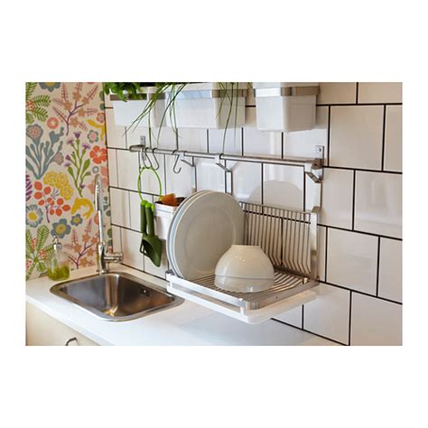 The clever design speeds up drying time by keeping your dishes, utensils, pots and pans separate, to maximise drainage and airflow. Wall-Mounted Drying Rack for the Dishes - HomesFeed