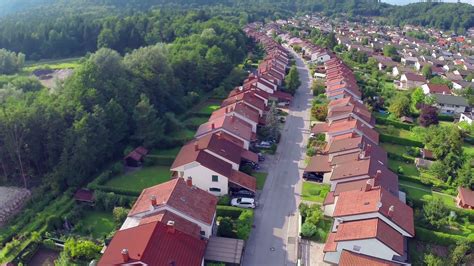 Curved Street With Suburban Houses From Aerial Flying Over Suburban